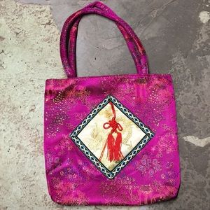 Pink embroidered bag